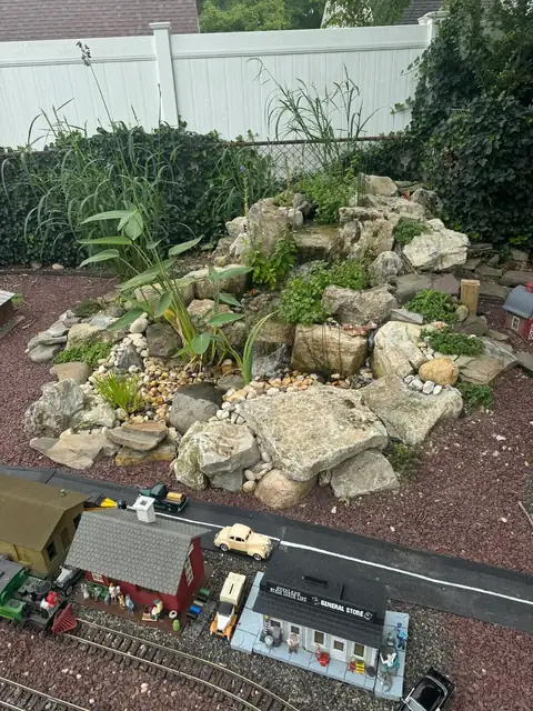 Shelton train waterfall in Hicksville, completed project, by Scott Anderson Design.