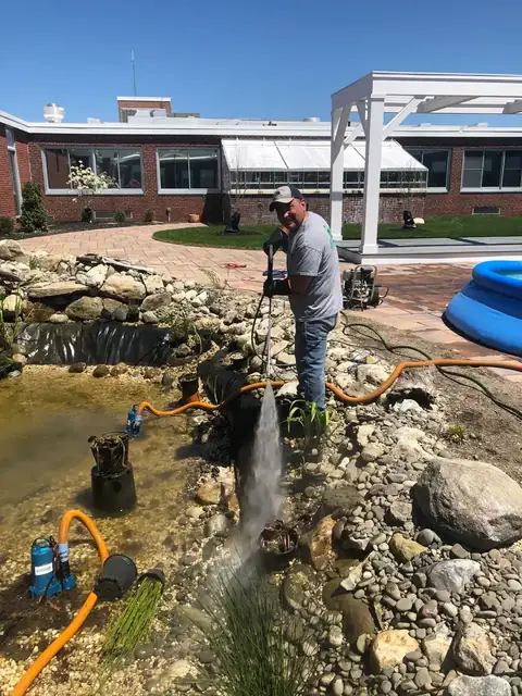 Pond cleanout pressure wash in Long Island, by Scott Anderson Design.