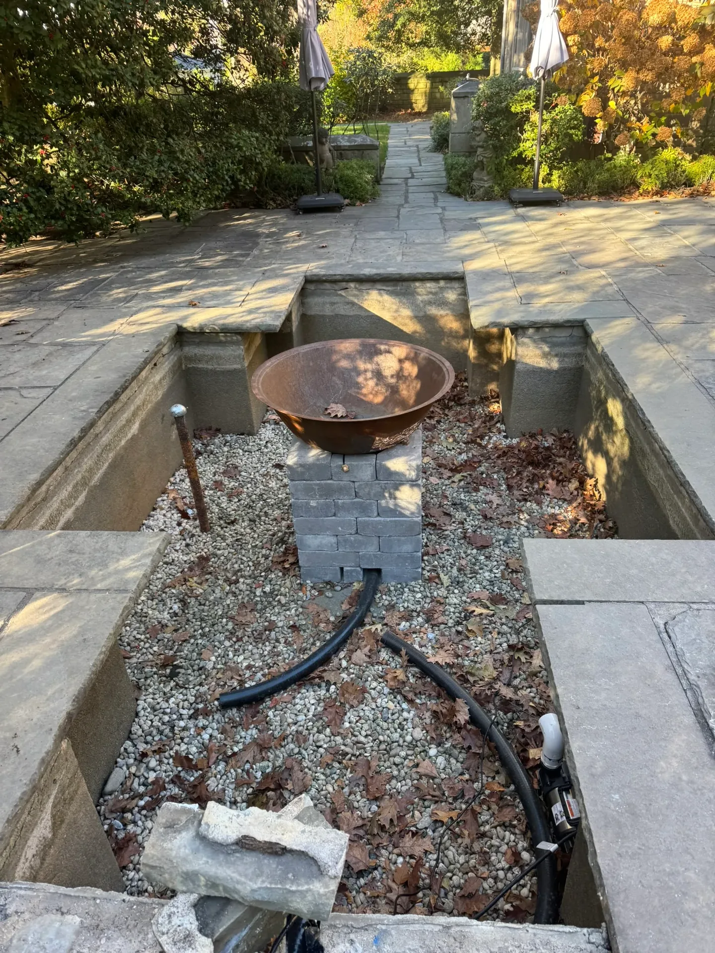 Basalt Fountain & Sunken Pond in Roslyn, NY during construction