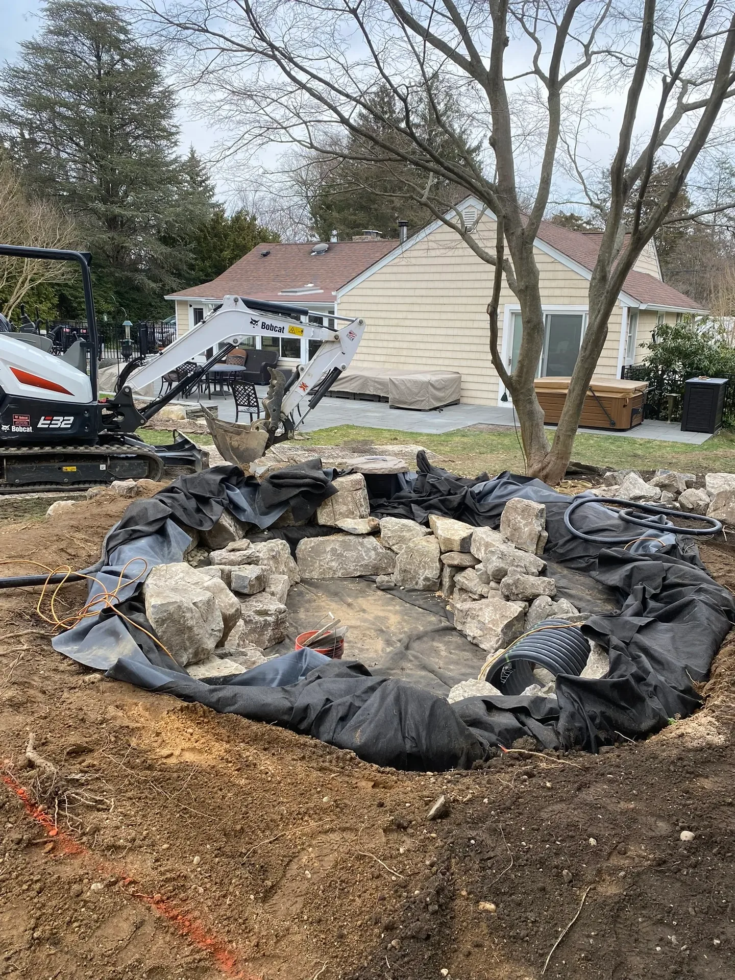 Romeo Naturalistic Pond in Northport, NY during construction