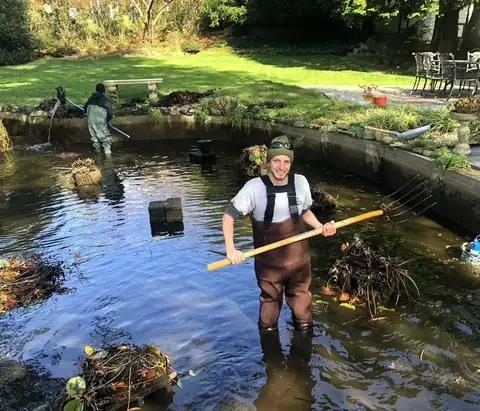 Pond cleanout crew in Halesite, by Scott Anderson Design.