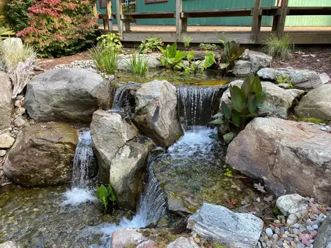 Pondless waterfall in Long Island, by Scott Anderson Design.