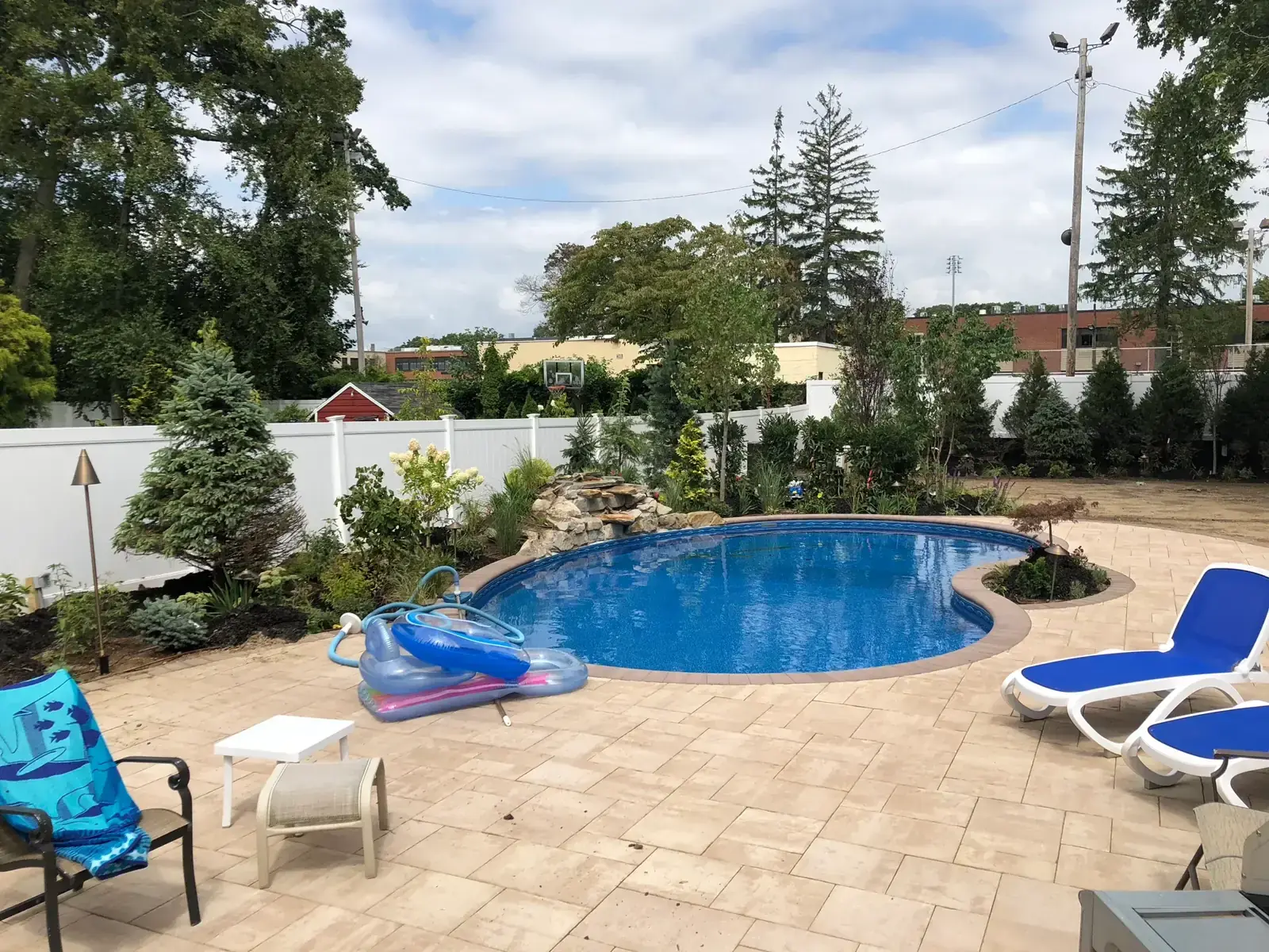 Pool terrace in paver with stone coping
