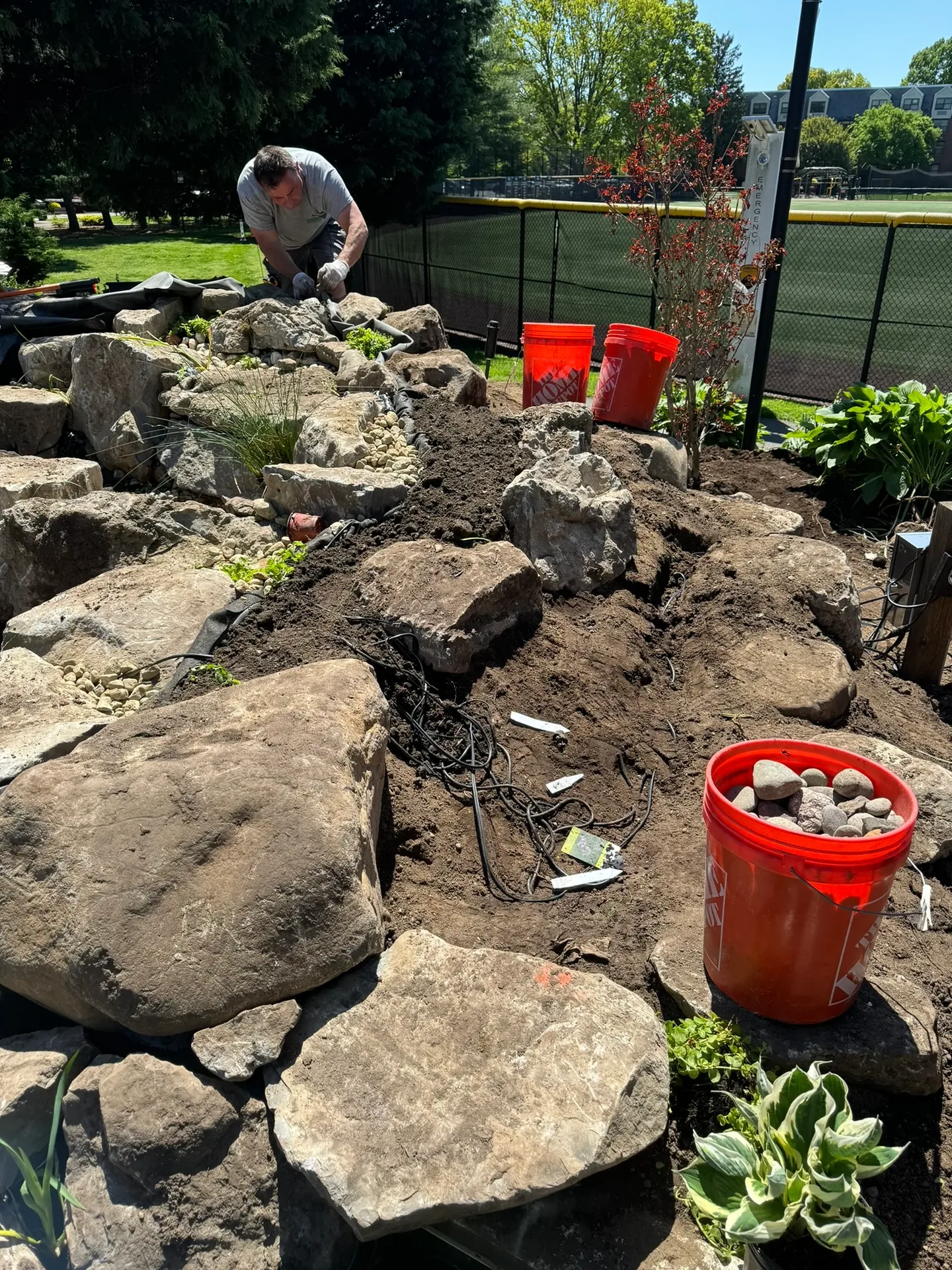 Adelphi University Waterfall in Garden City, NY during landscaping around the installed boulders