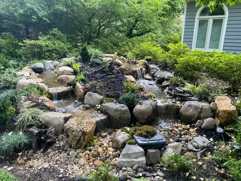 Pondless waterfall stream in Long Island, by Scott Anderson Design.