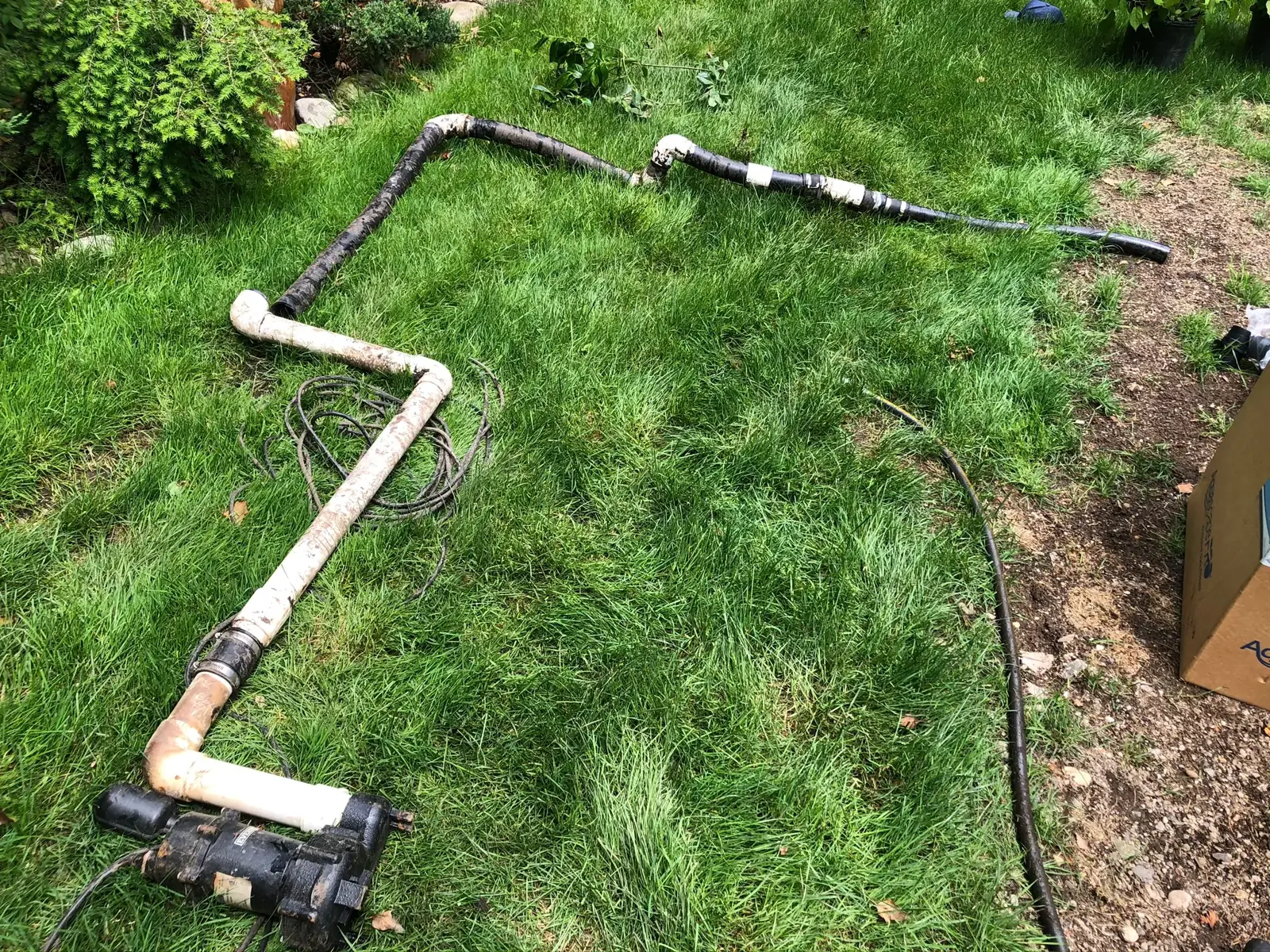 Drainage installation on a Long Island property by Scott Anderson Design.