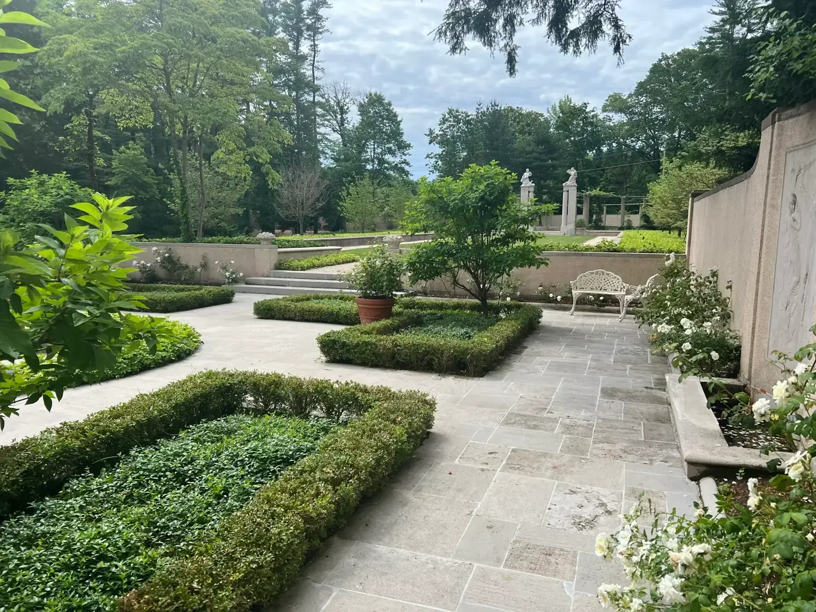 Bluestone paths through a formal parterre
